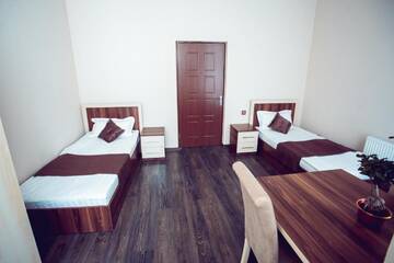 Фото номера Односпальная кровать в общем номере Хостелы Grand Qafqaz Hostel г. Гянджа 4