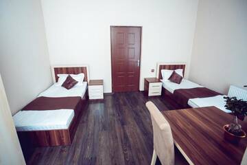 Фото номера Односпальная кровать в общем номере Хостелы Grand Qafqaz Hostel г. Гянджа 7